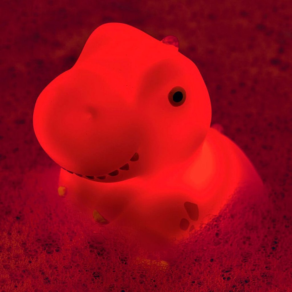 Dinosaurio luminoso de baño